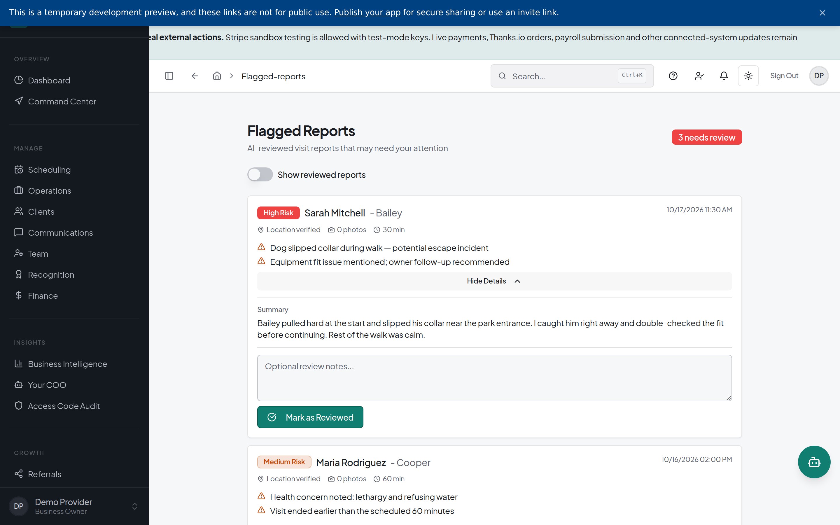 Expanded flagged visit report shows a care summary, an optional review-notes field and a Mark as Reviewed button, while other reports remain listed below.